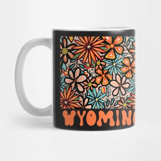 Wyoming State Design | Artist Designed Illustration Featuring Wyoming State Filled With Retro Flowers with Retro Hand-Lettering Mug